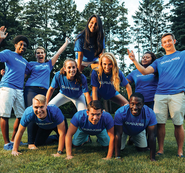 quadjobbers forming a human pyramid
