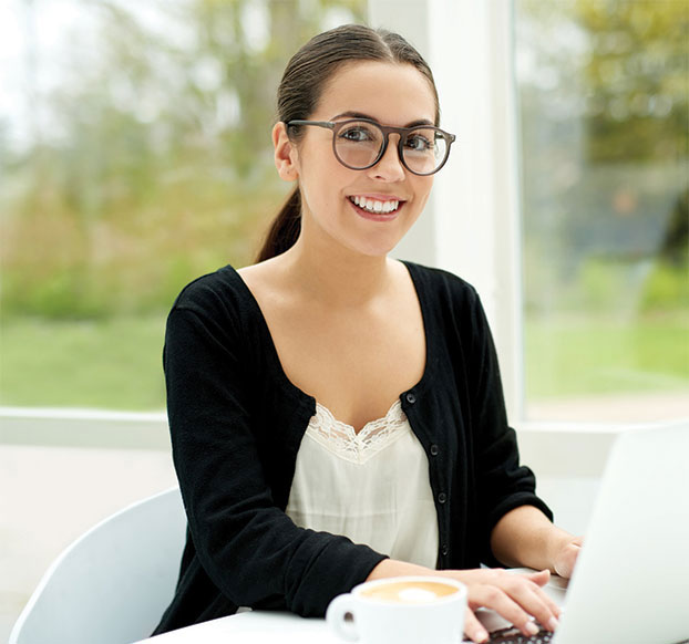 female student working at computer