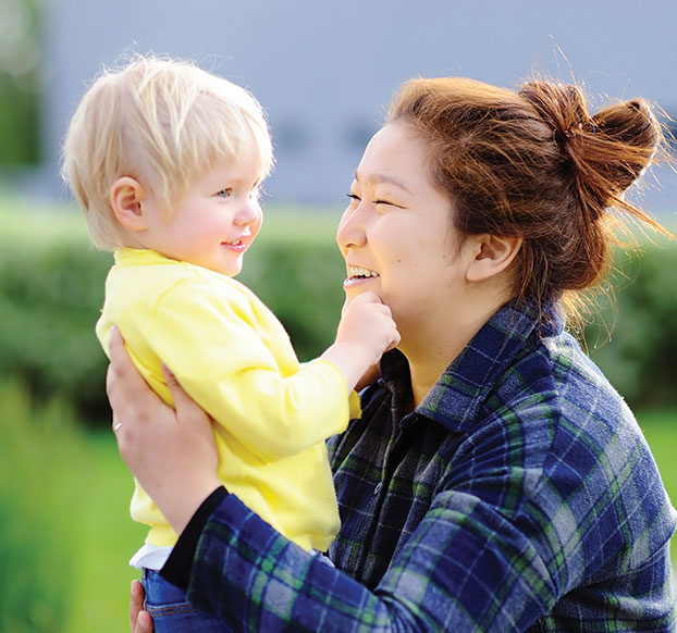 student caring for a young child